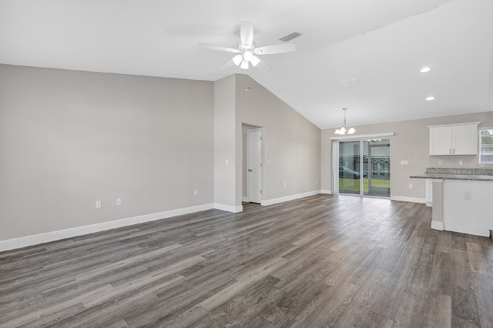 Modern 3-Bedroom Home | Screened Lanai, Granite Kitchen & 2-Car Garage property image