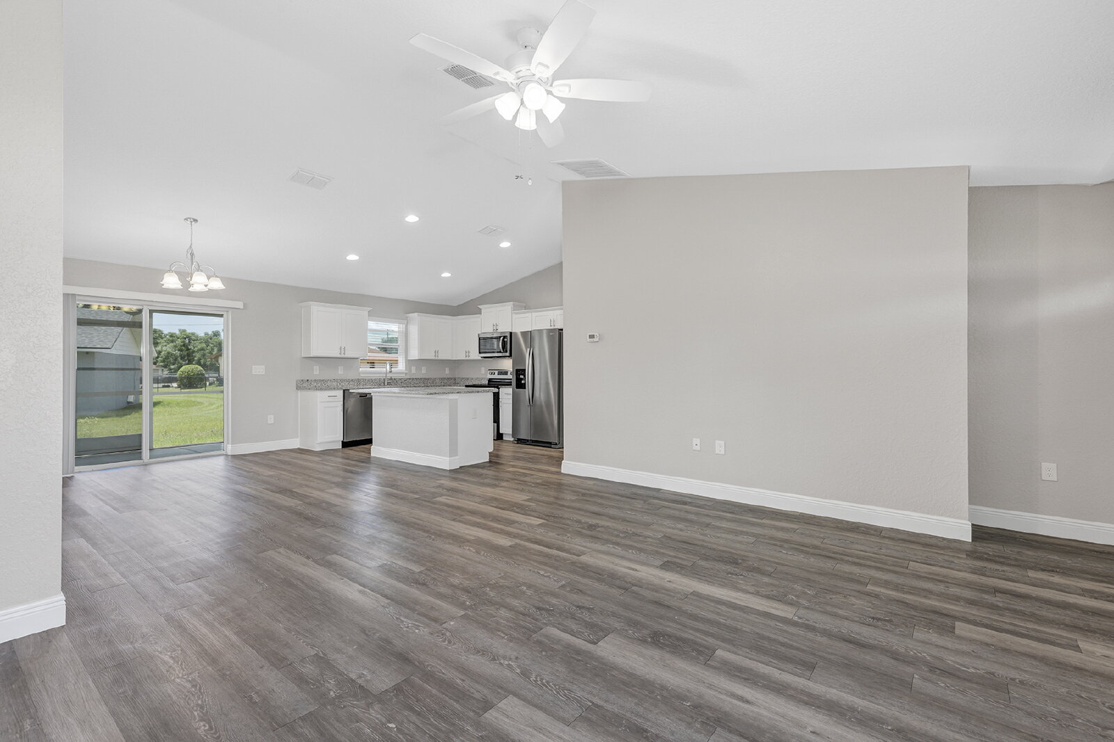 Modern 3-Bedroom Home | Screened Lanai, Granite Kitchen & 2-Car Garage property image
