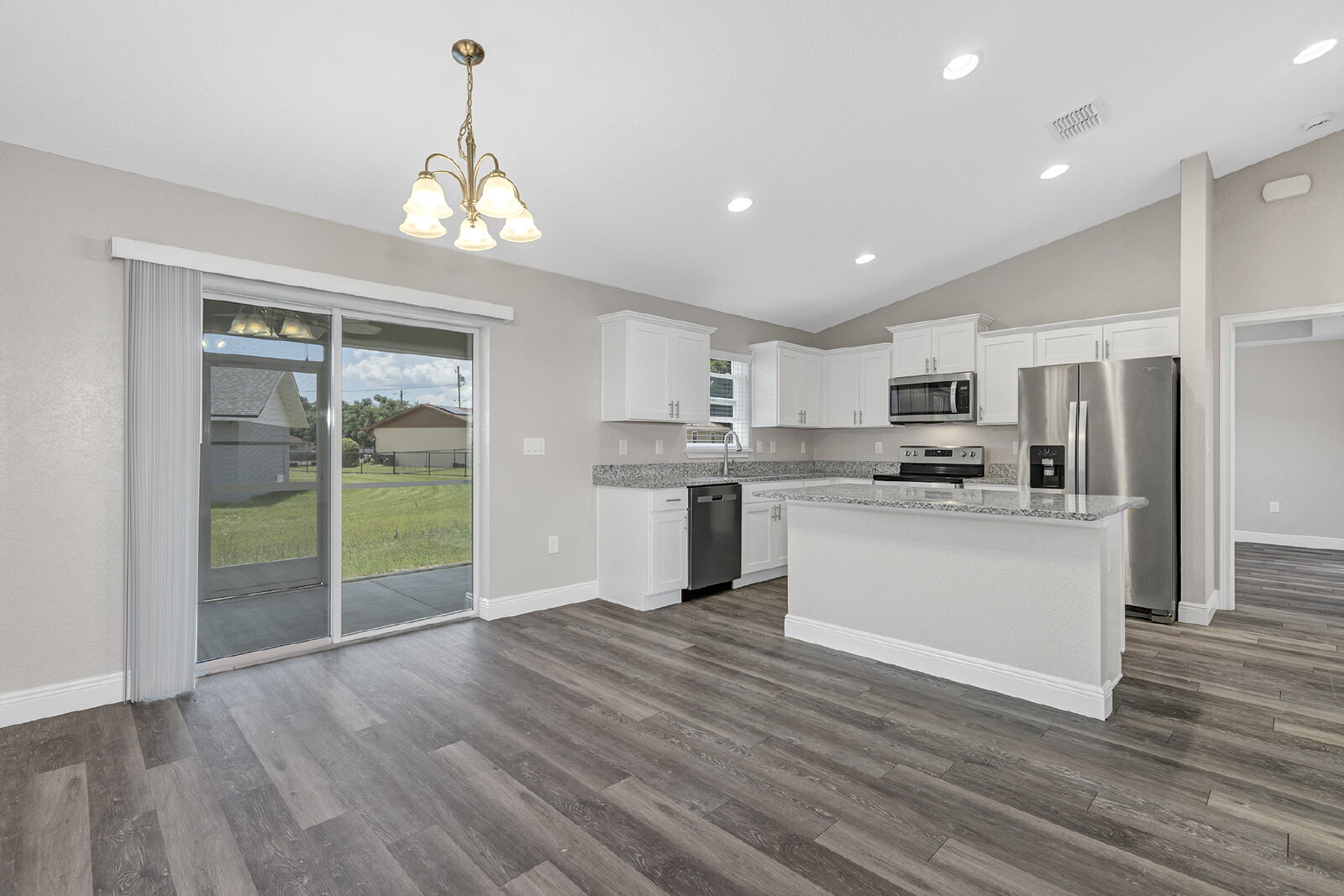 Modern 3-Bedroom Home | Screened Lanai, Granite Kitchen & 2-Car Garage property image
